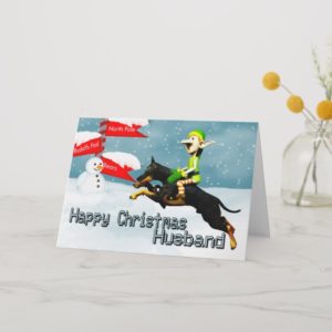 Elf with doberman in the snow christmas husband holiday card